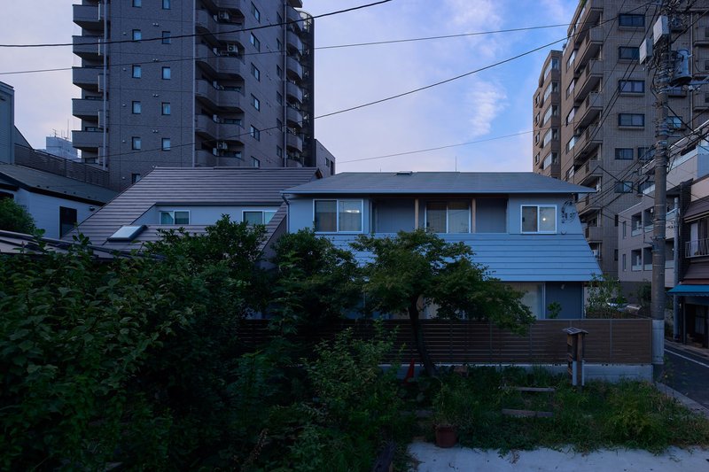 Two Large Roofs Leaning Together