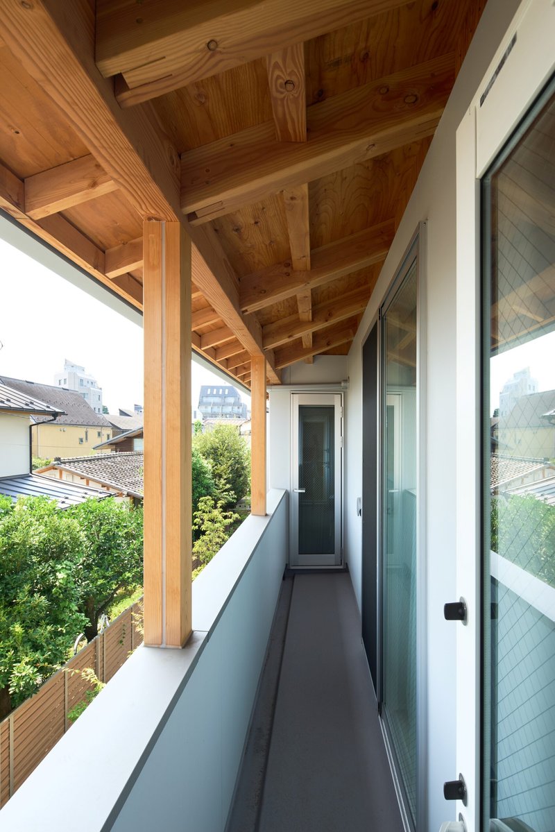 Two Large Roofs Leaning Together