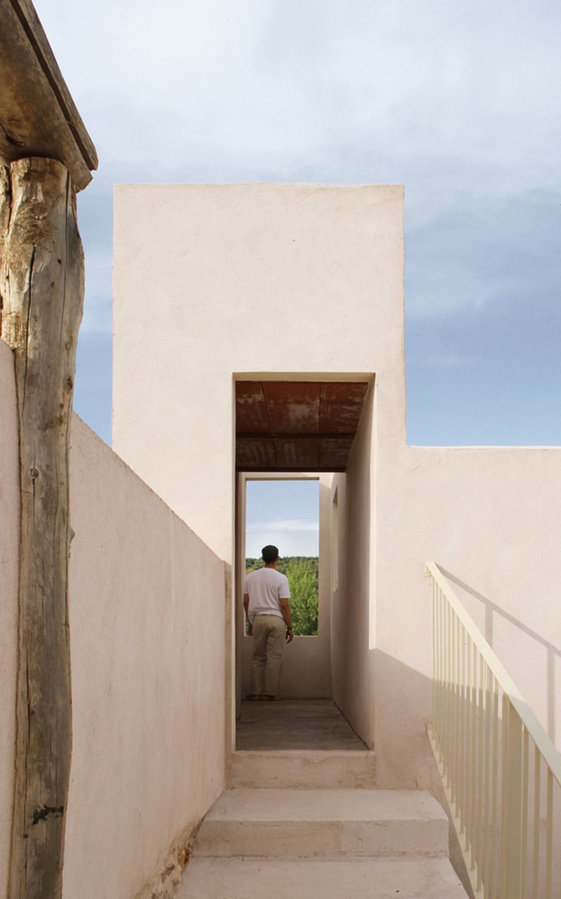 stone and clay rebuild former rural stable as a seasonal refuge in spanish countryside