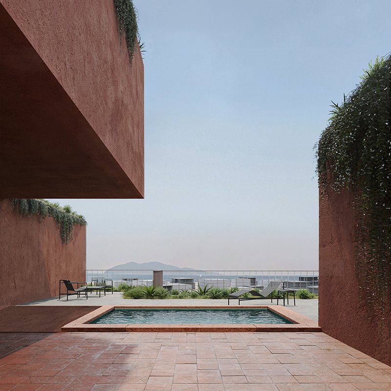 stacked earthen red volumes shape tectonic rhythm of residential tower in athens