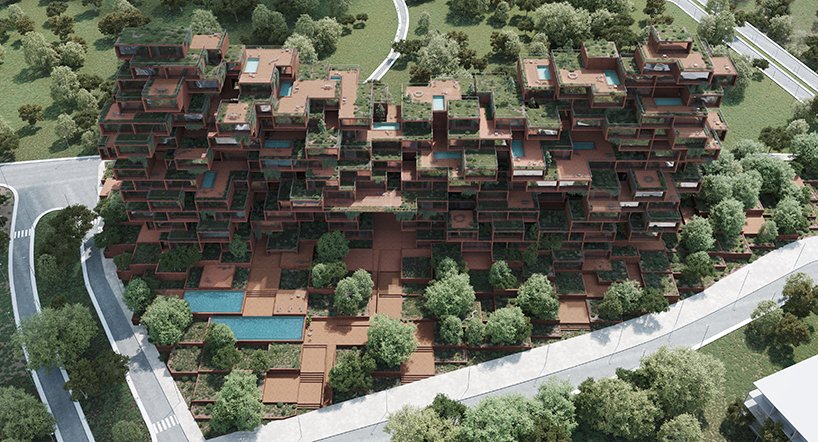 Volumes vermelhos de terra empilhados moldam o ritmo tectônico da torre residencial em Atenas